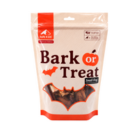 A stand-up pouch of Bark N' Big 'Bark or Treat' small dog treats, featuring a Halloween-themed design with orange accents, a bat silhouette, and a clear window showing the treats inside.